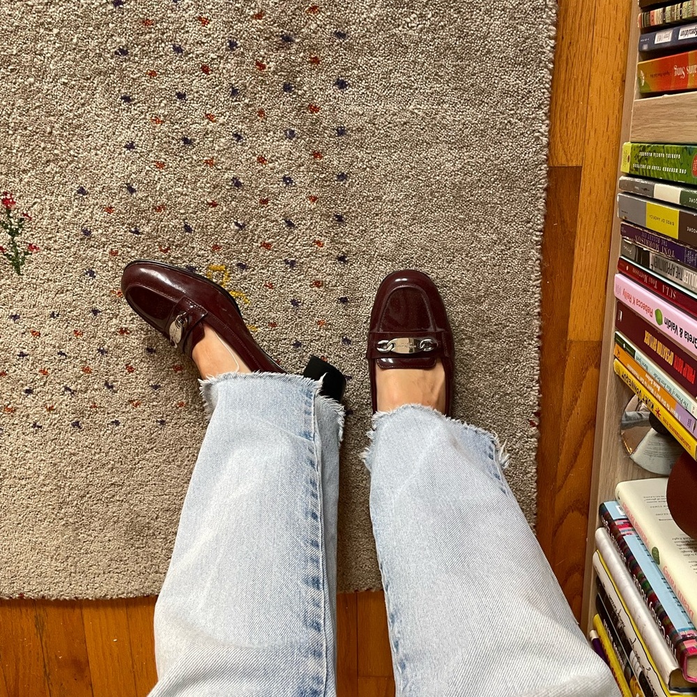 Burgundy heeled loafers by Michael Kors